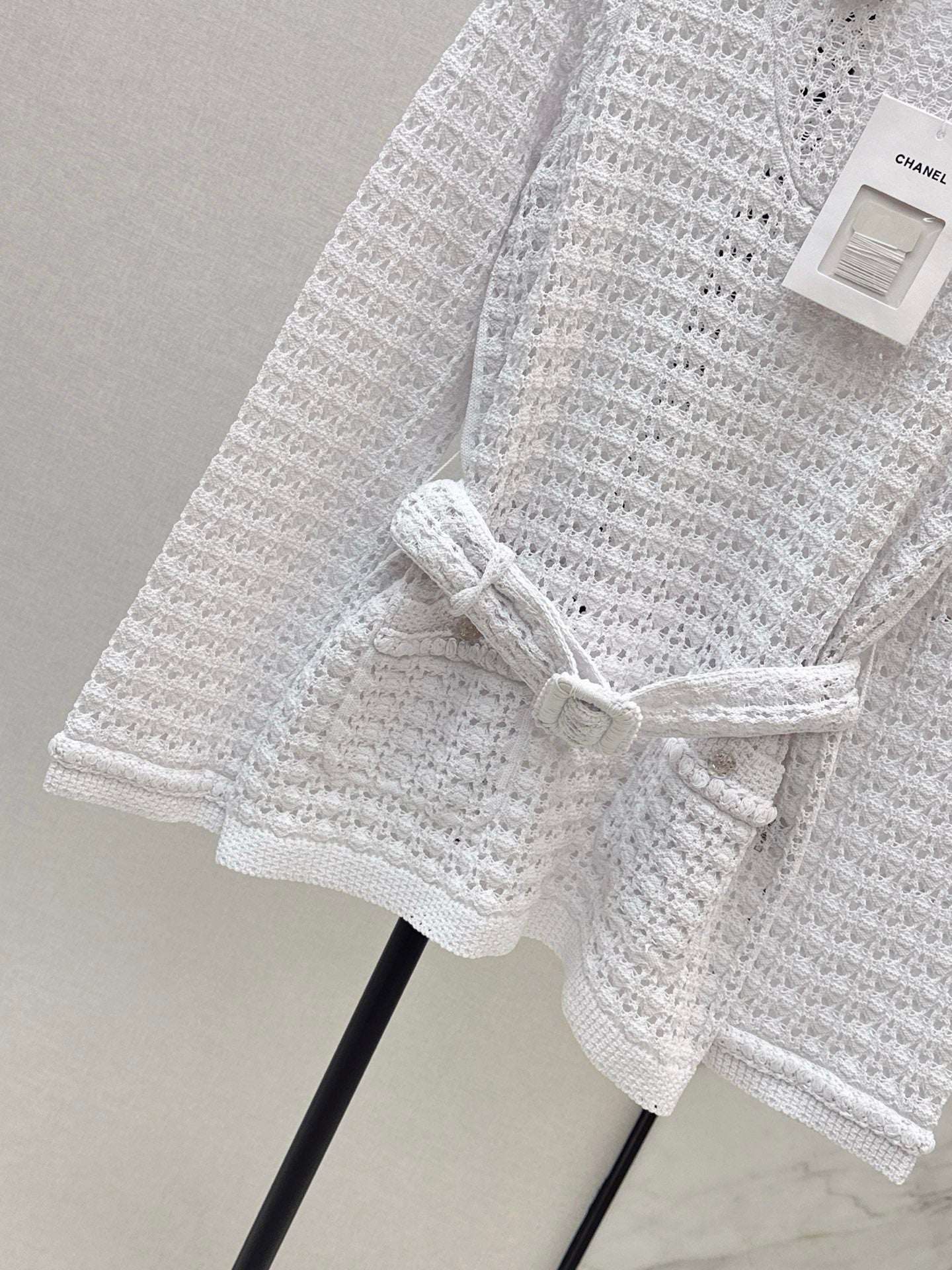 Located openwork knit top