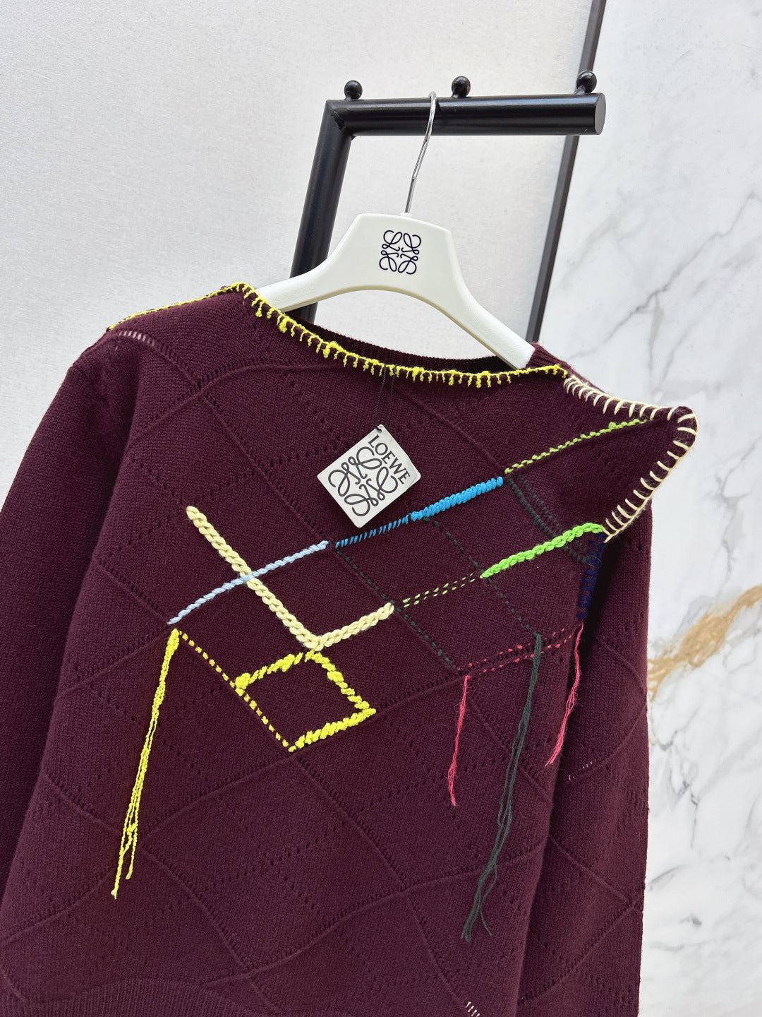 Asymmetrical crew neck sweater