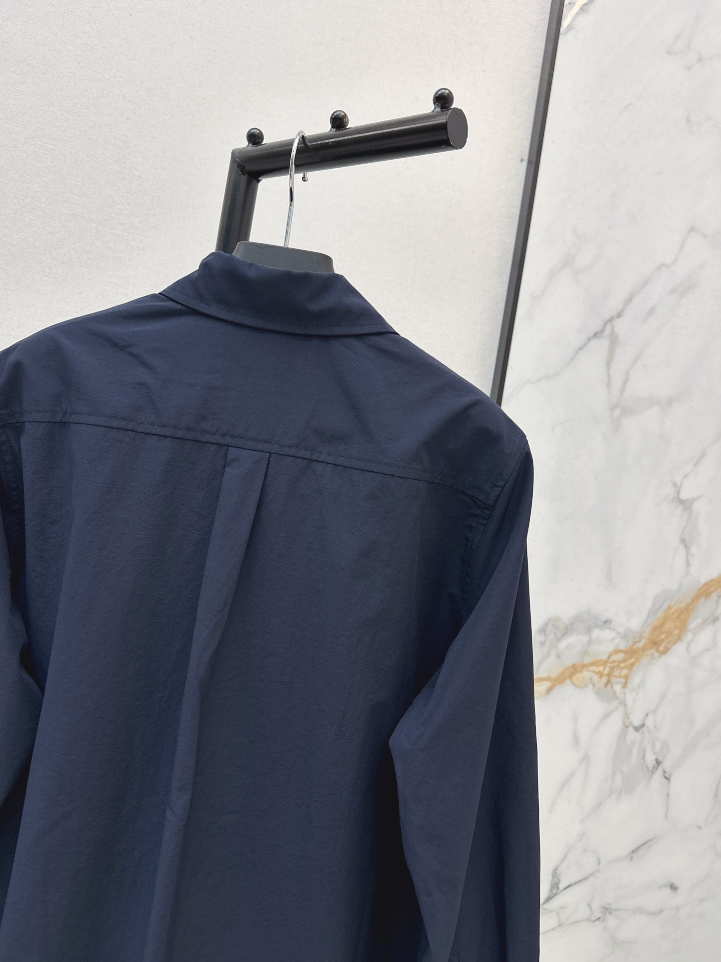 Triangle logo loose-fitting shirt