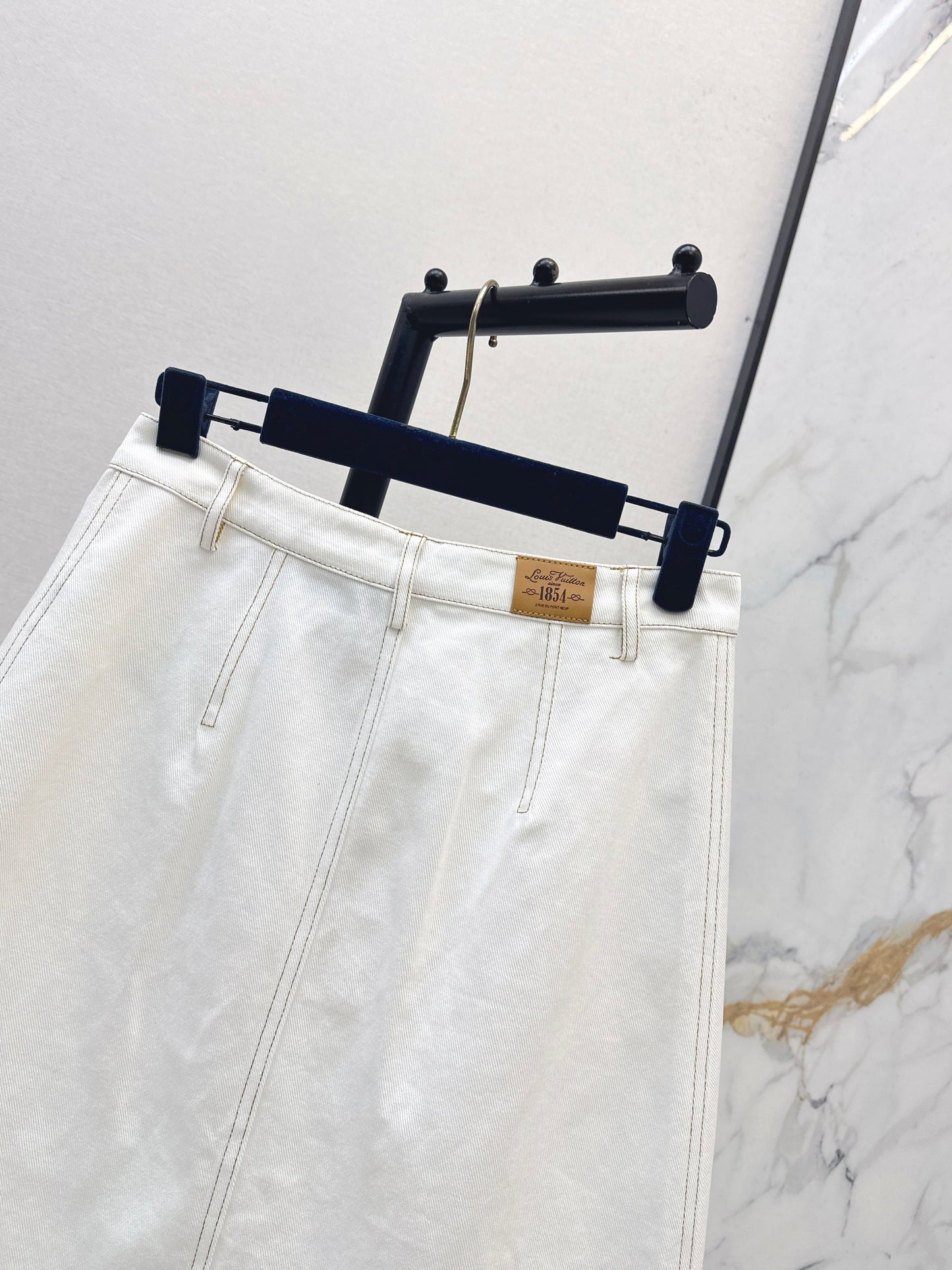 26ss Color-blocked minimalist midi skirt