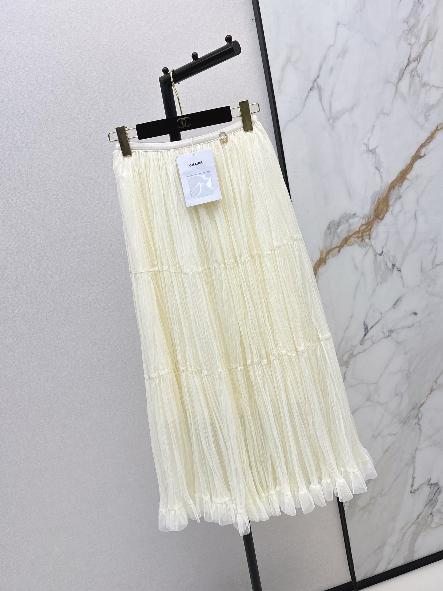 26ss A flowing, tulle-trimmed midi skirt
