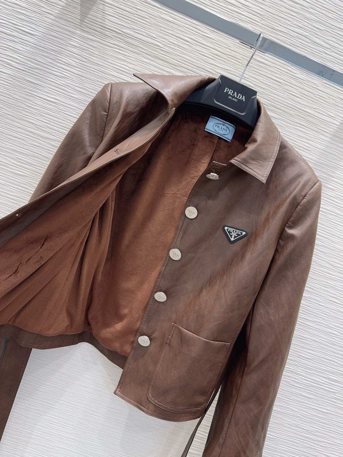 26Long-Sleeve PU Leather Jacket with Triangular Logo and Belt