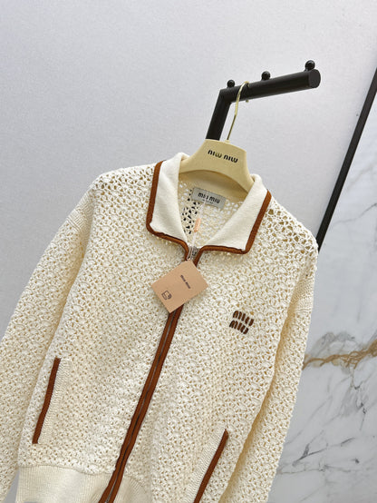 Hand-crocheted jacket with vintage suede patchwork