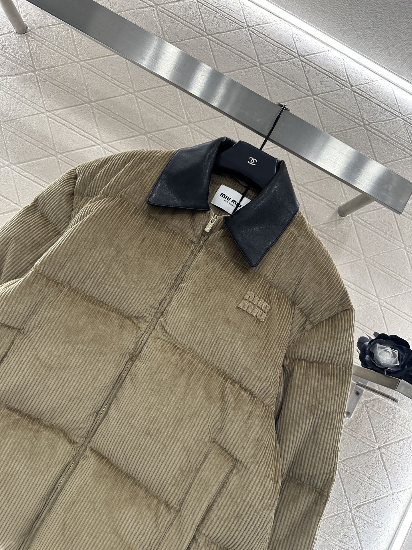 Leather collar corduroy down jacket