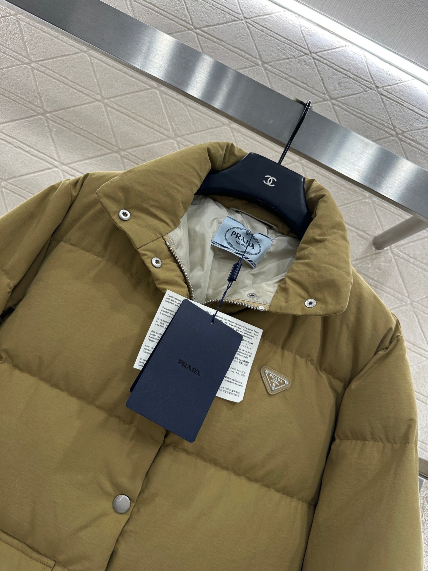 Rectangular embossed stand up collar down jacket
