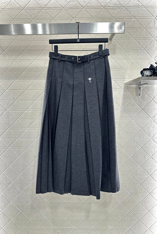 Mid length pleated skirt with waist belt