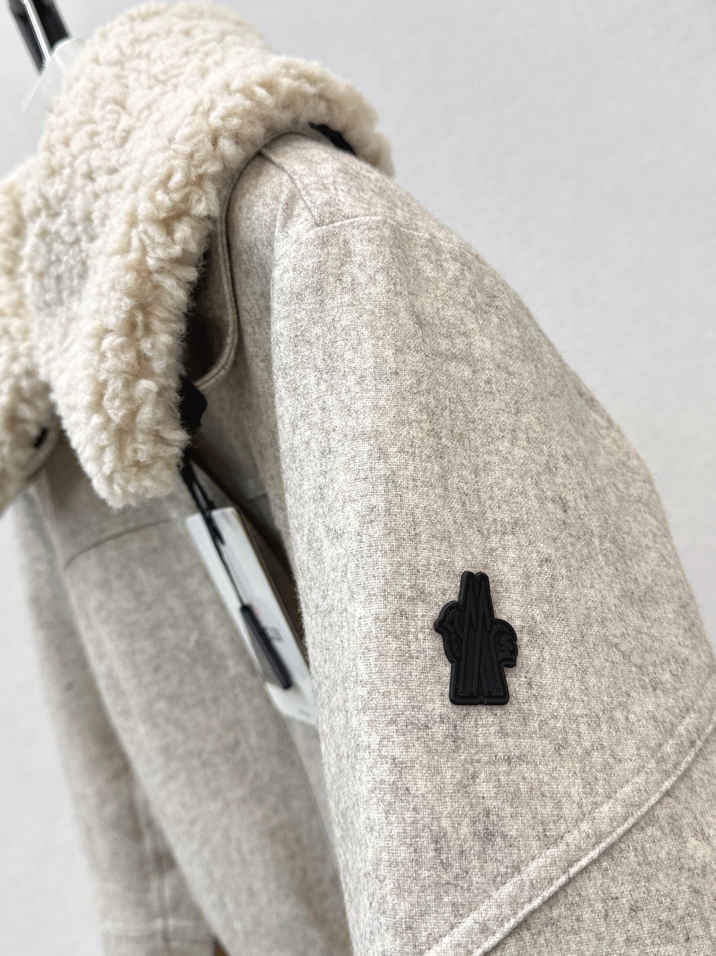 Lamb fur collar waistband hooded down jacket
