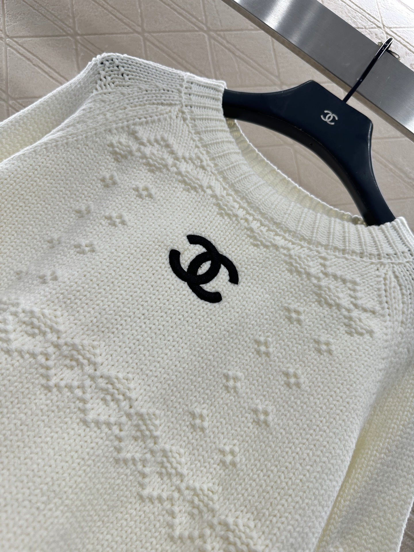 Embroidered crochet sweater