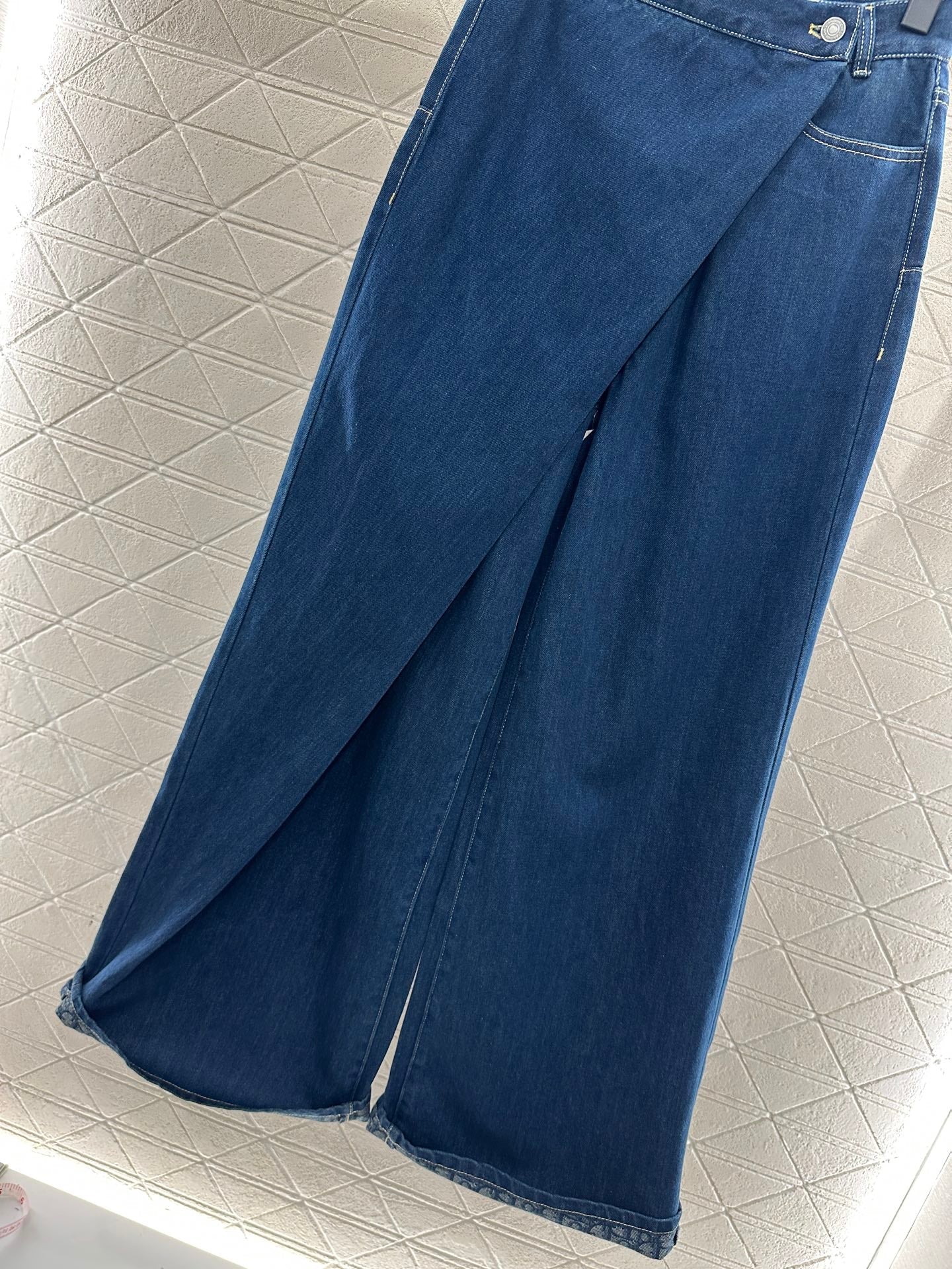 Deconstructing wide leg denim pants