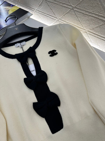 Hollow bow long sleeves