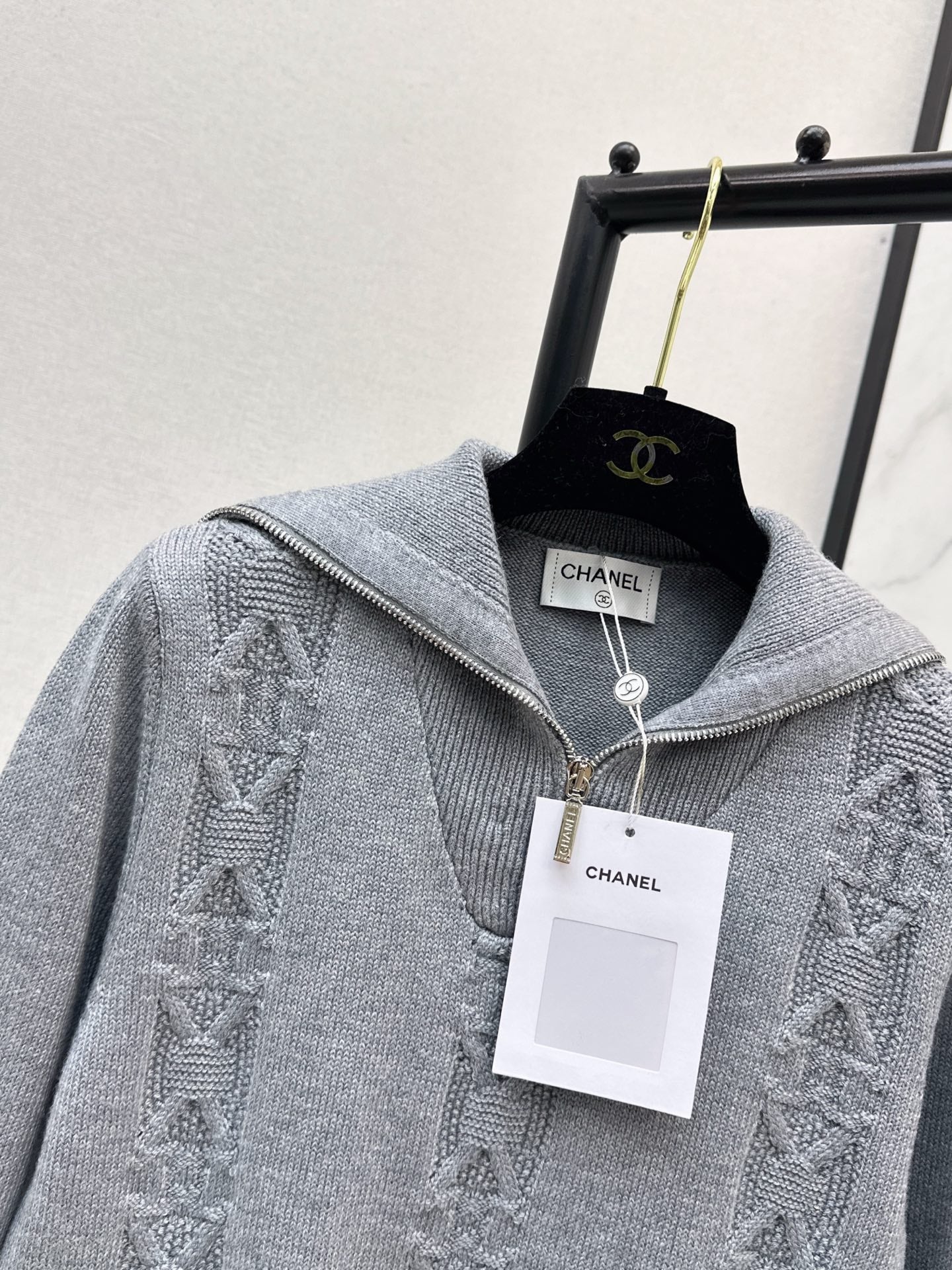 Half-open zip-up knit sweater