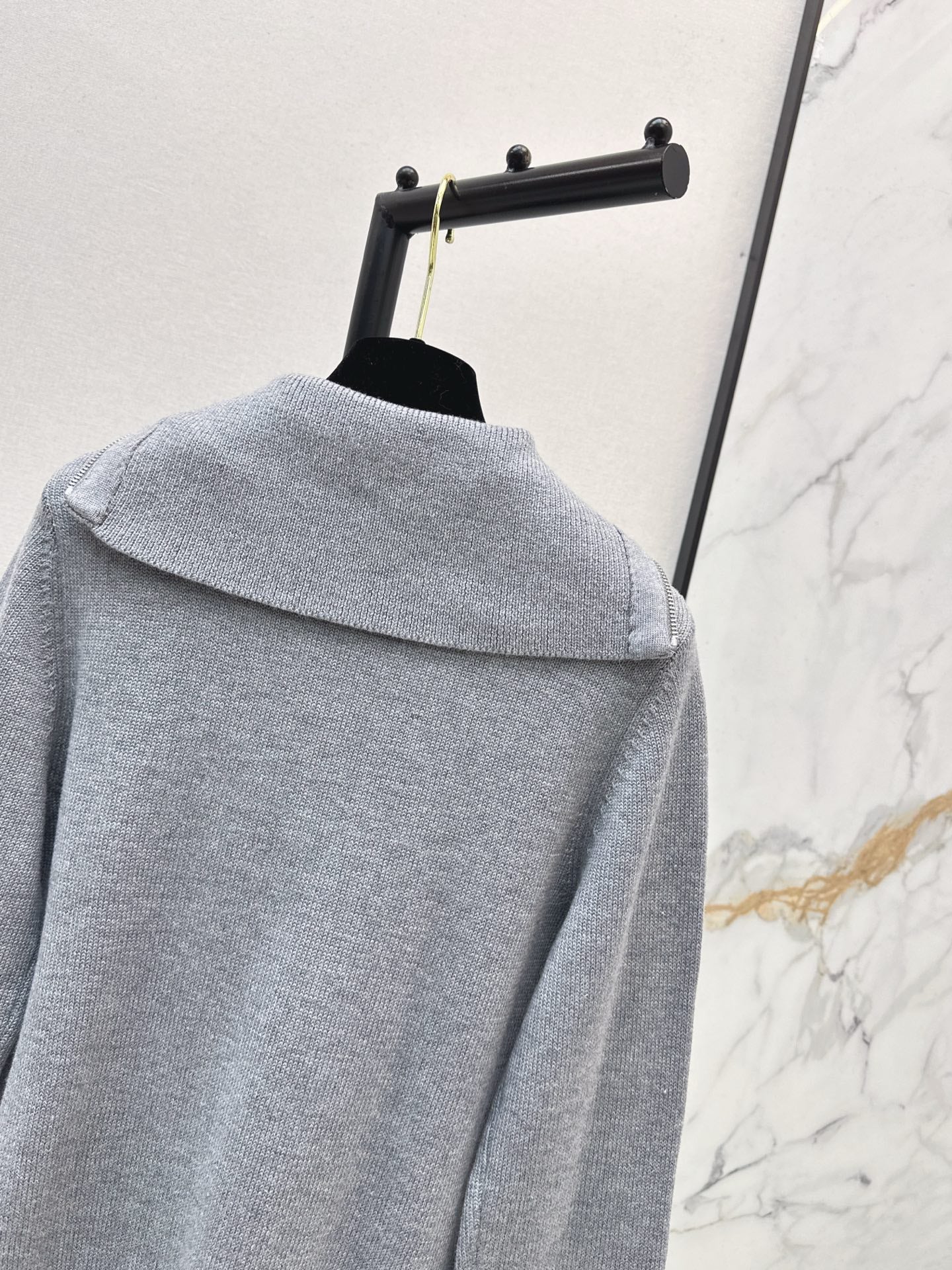 Half-open zip-up knit sweater