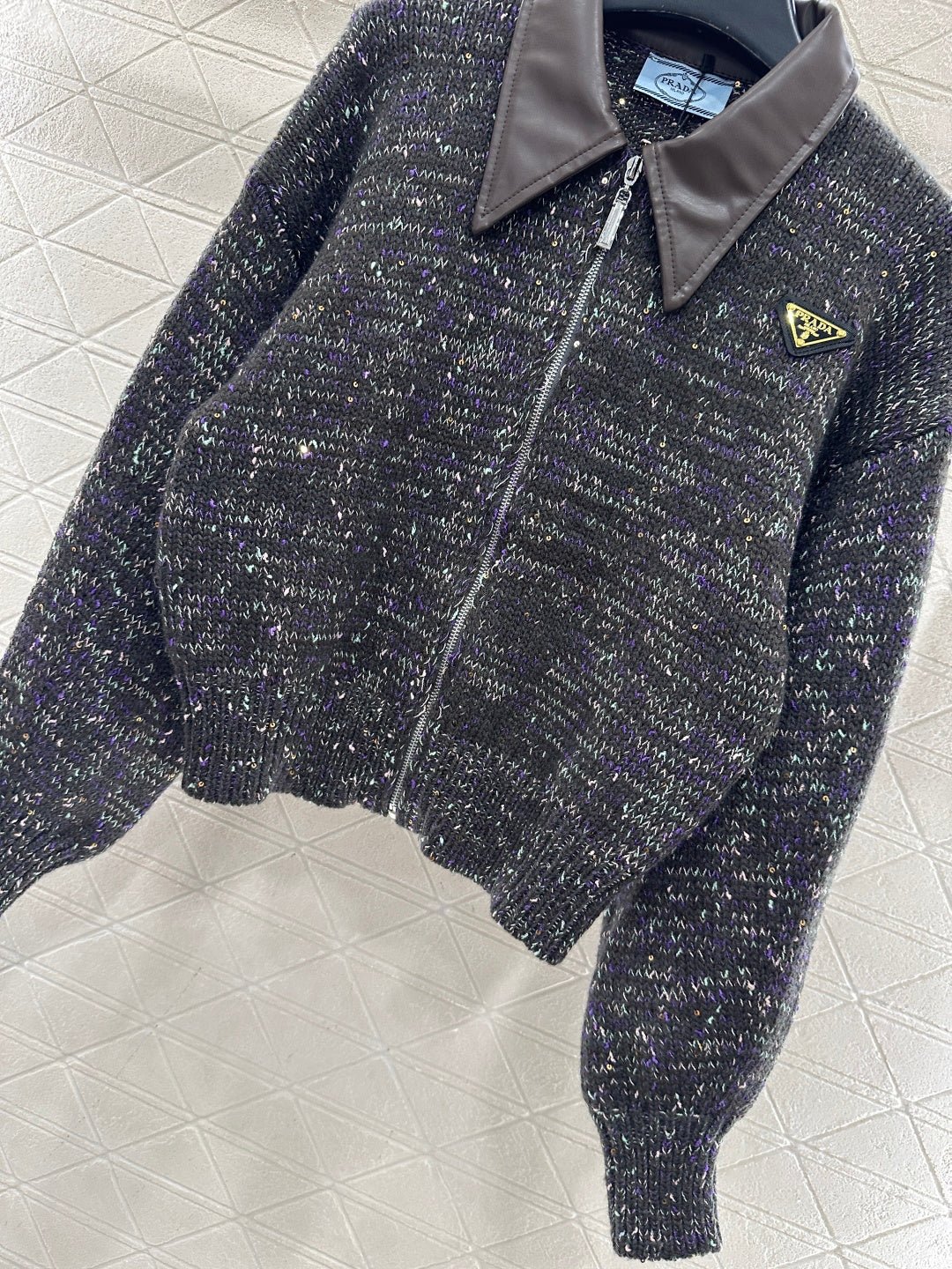 Leather-trimmed lapel zip-up jacket