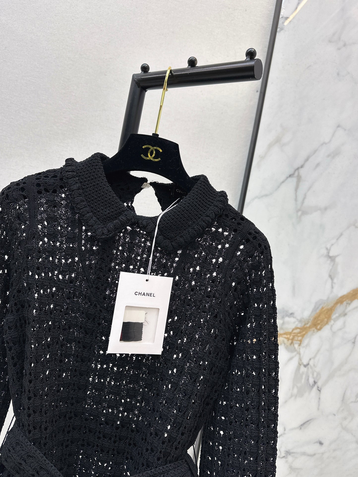 Located openwork knit top