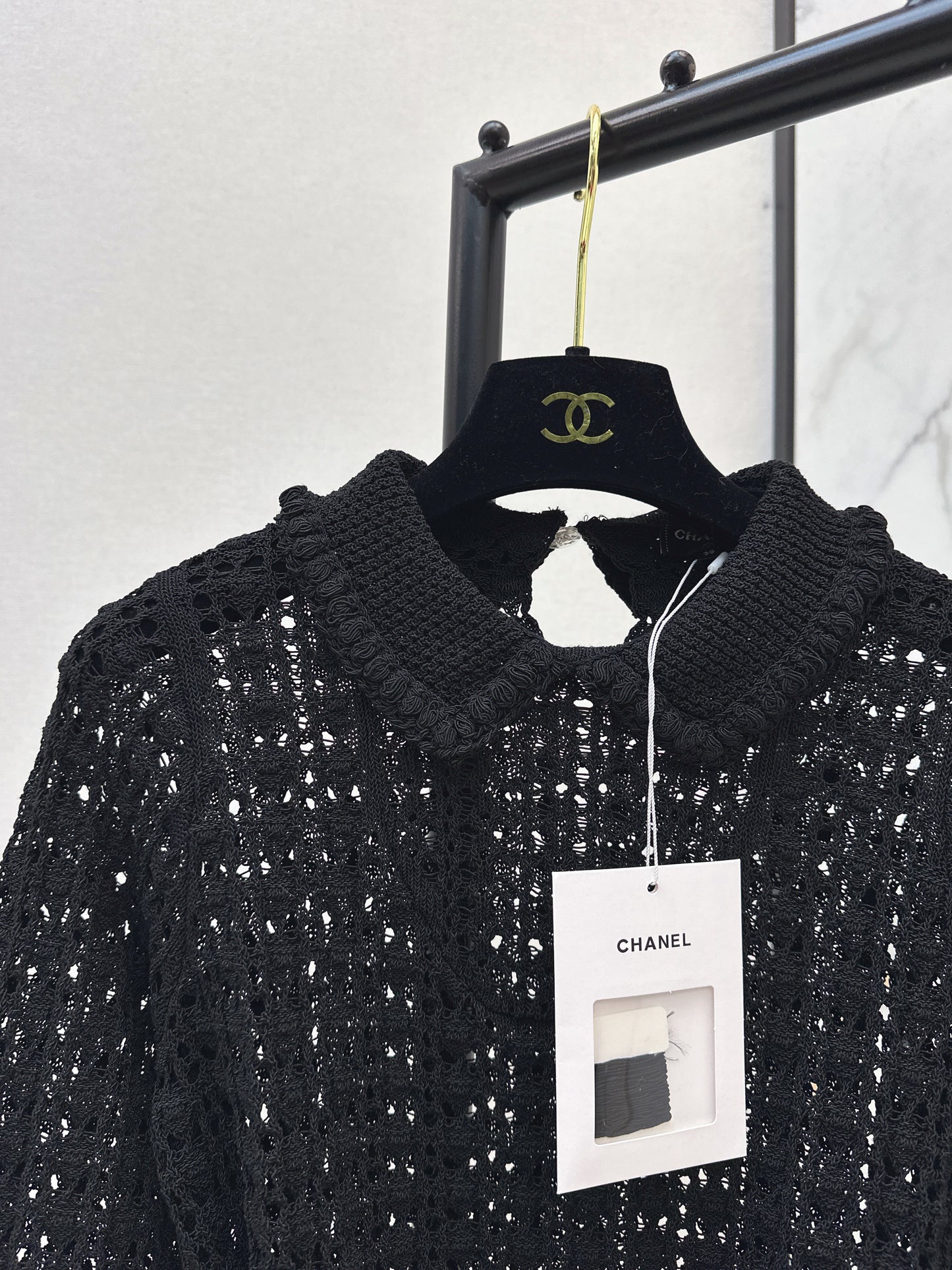 Located openwork knit top