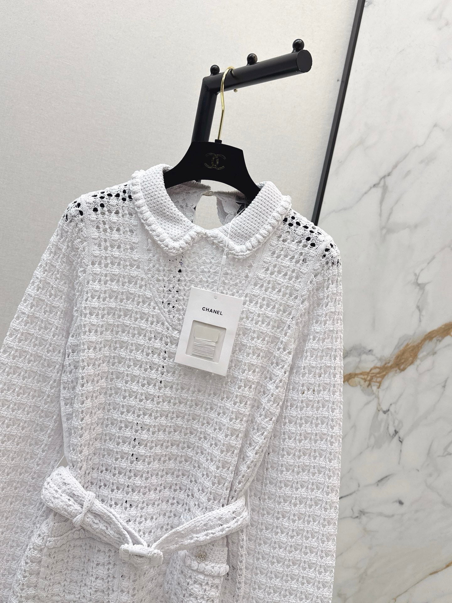 Located openwork knit top