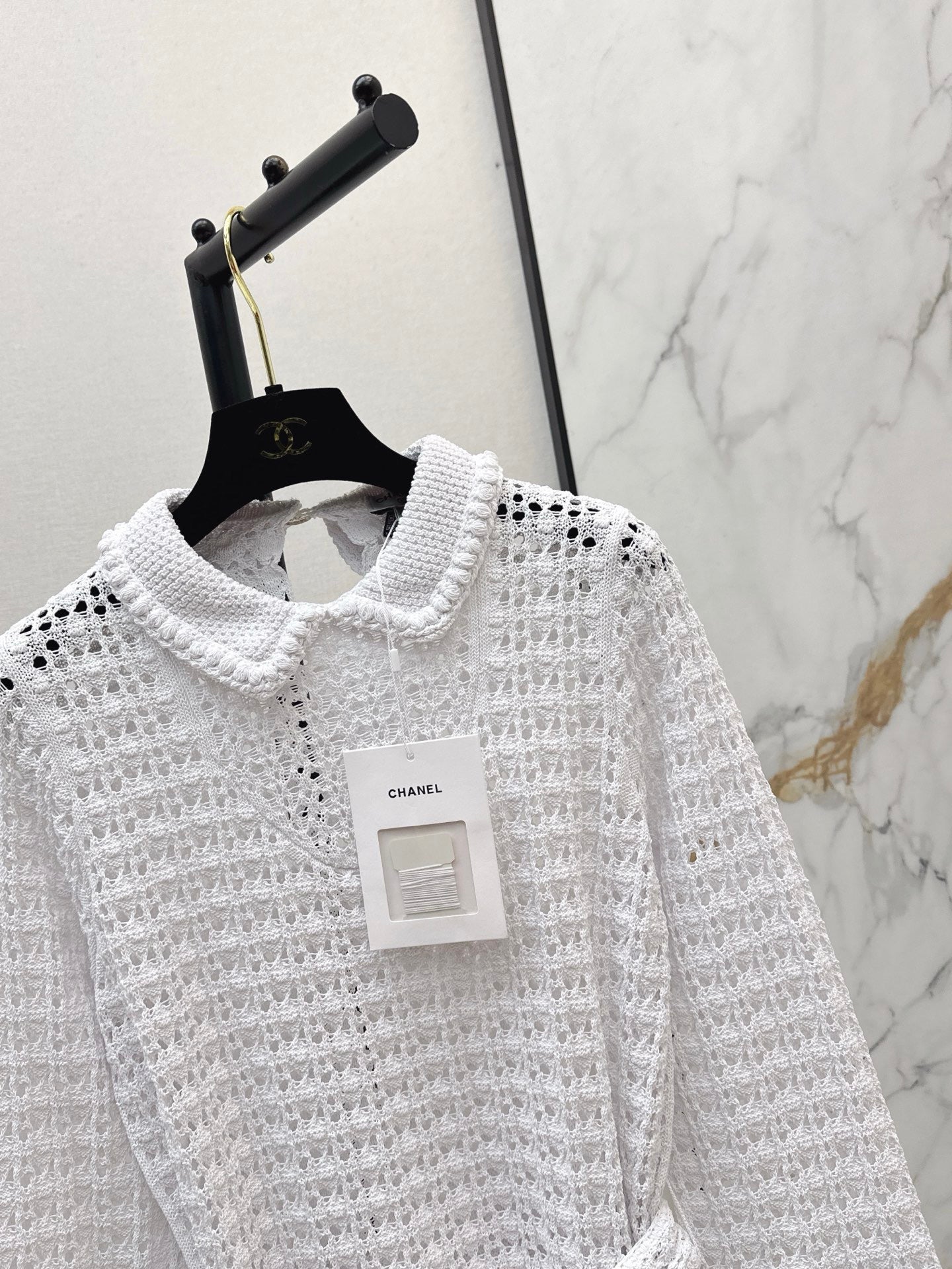 Located openwork knit top