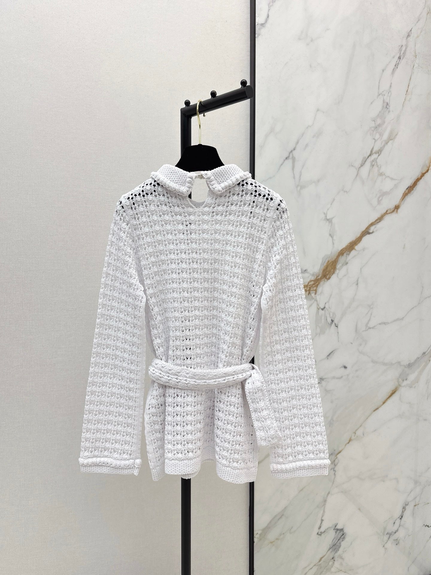 Located openwork knit top