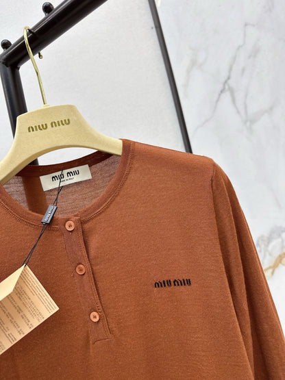 Half-open placket knit sweater