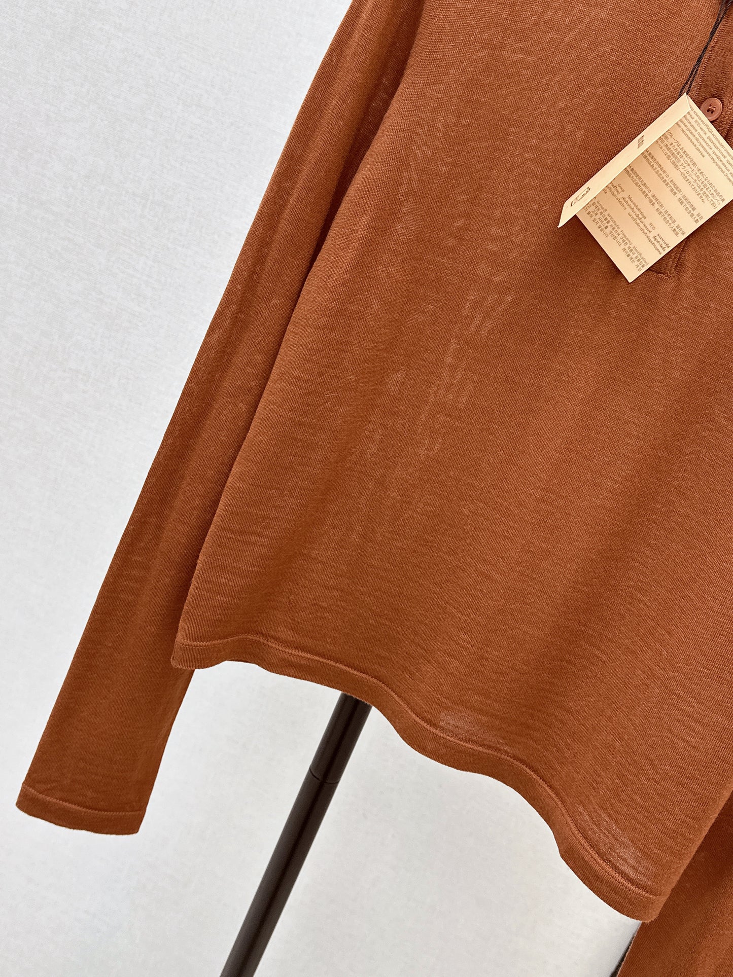 Half-open placket knit sweater