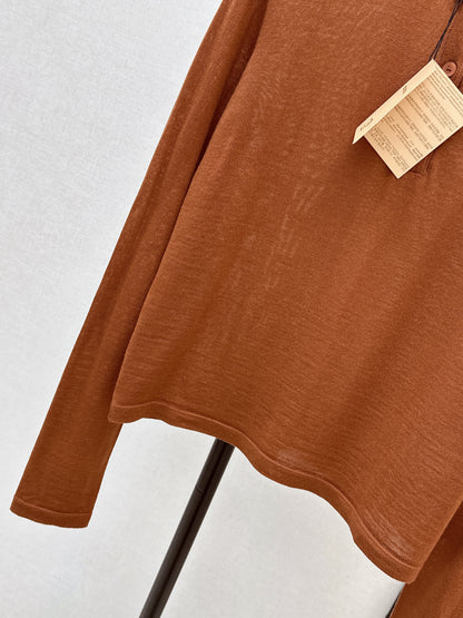 Half-open placket knit sweater