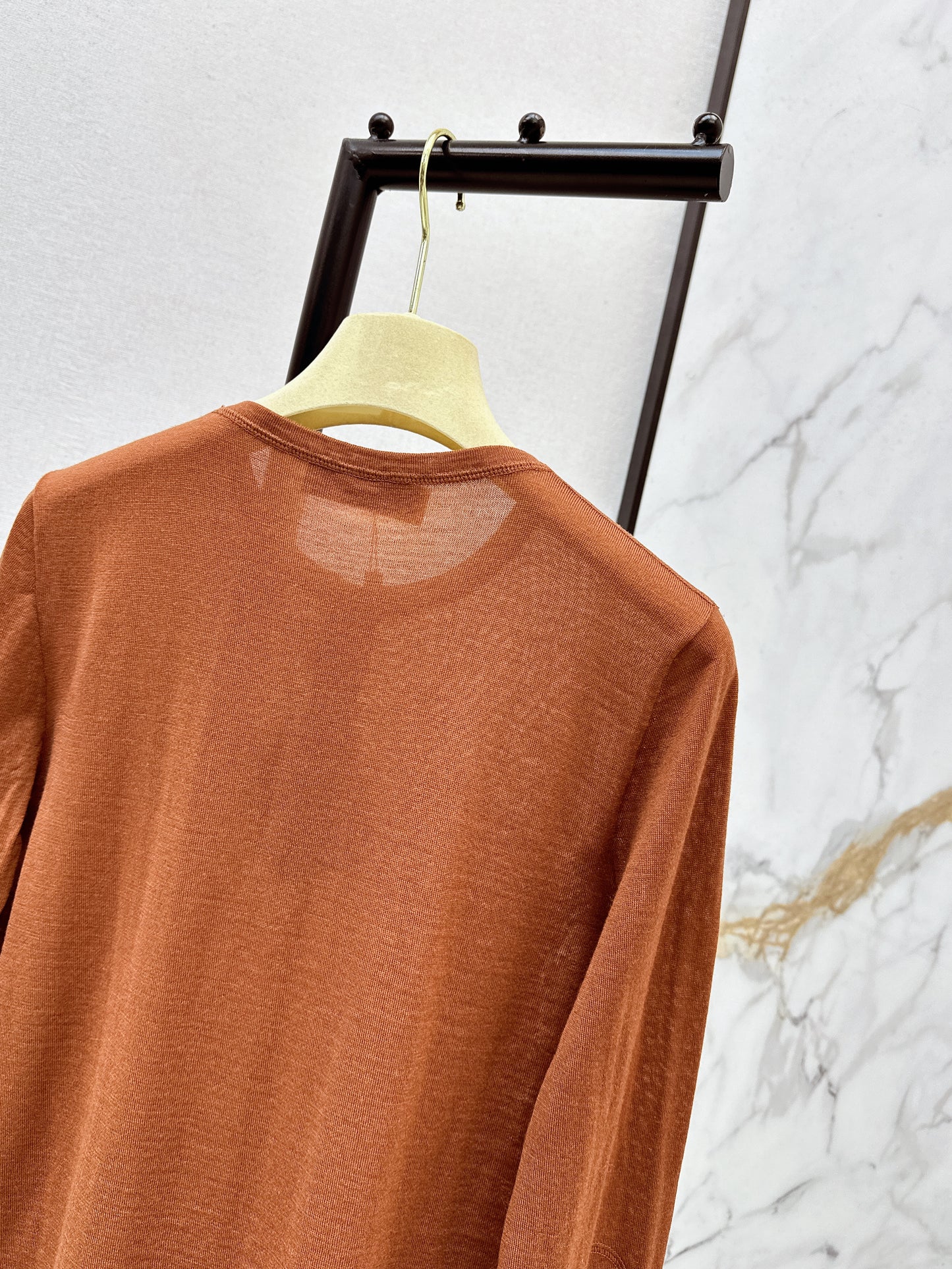 Half-open placket knit sweater