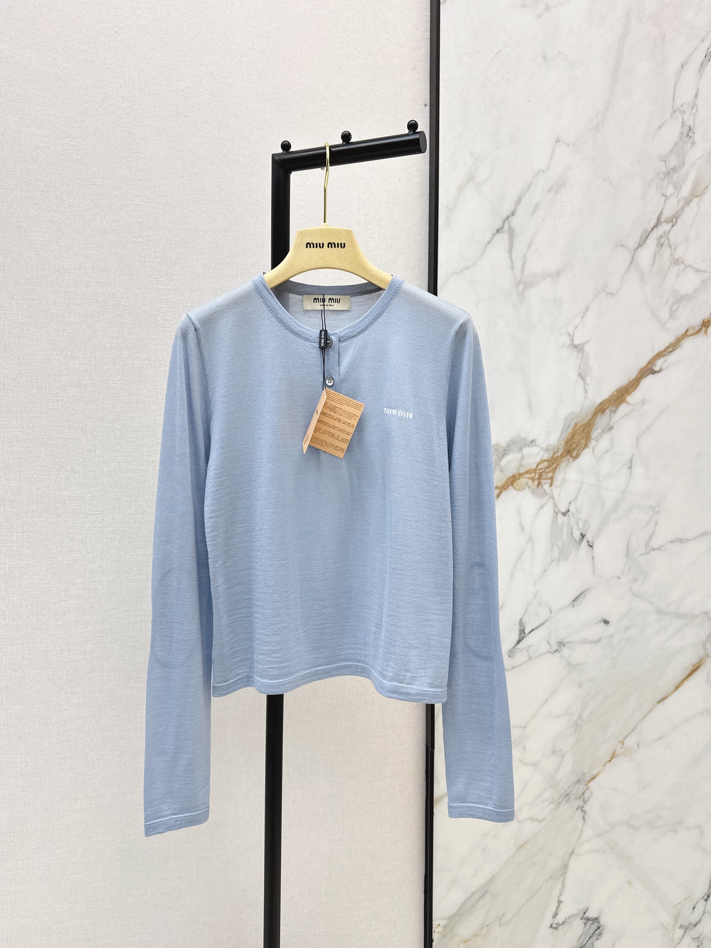 Half-open placket knit sweater