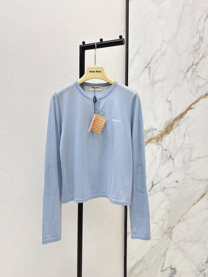 Half-open placket knit sweater