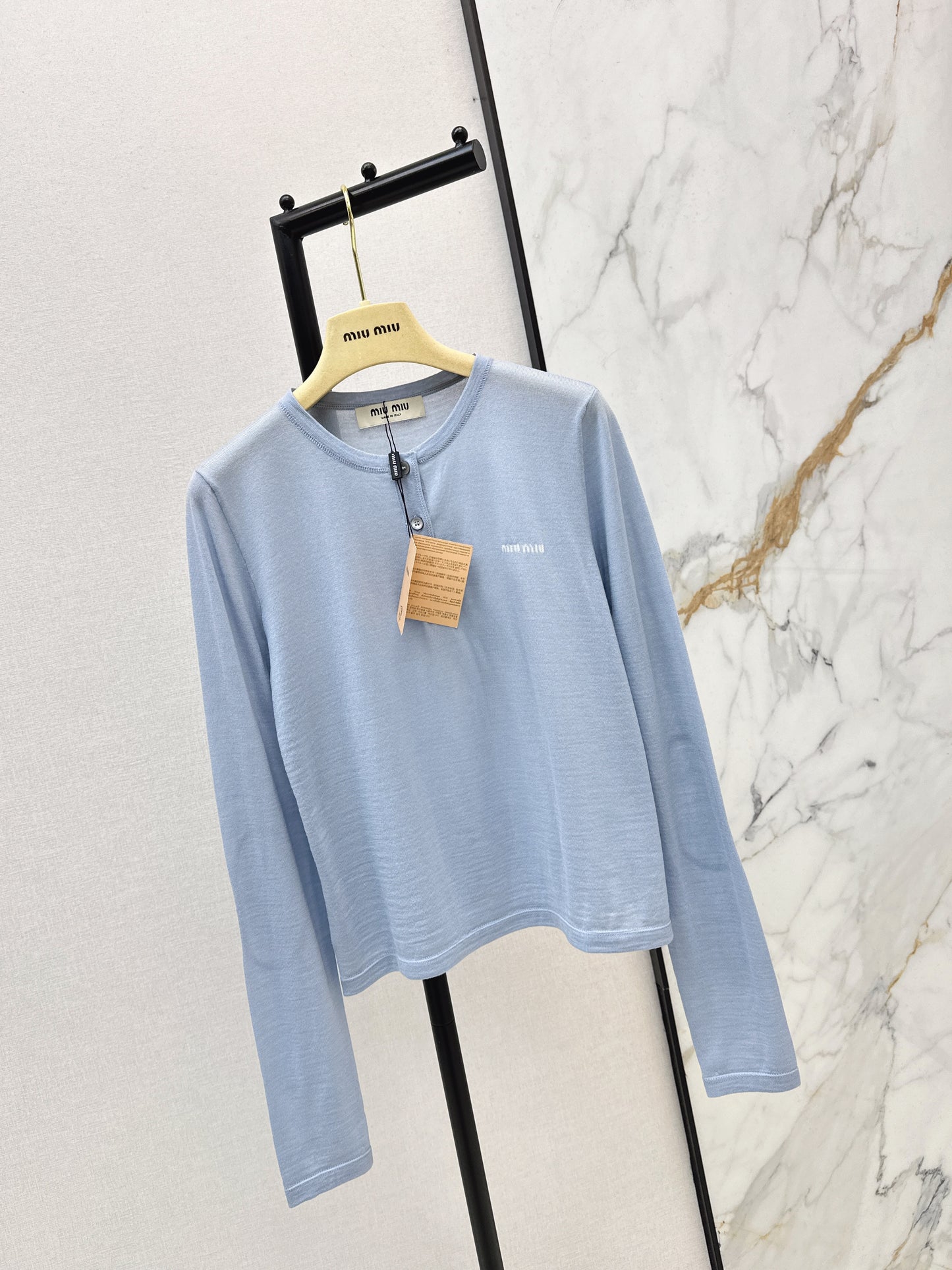 Half-open placket knit sweater