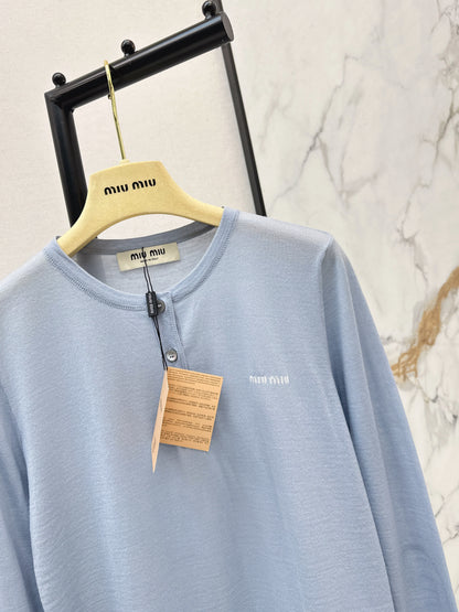 Half-open placket knit sweater