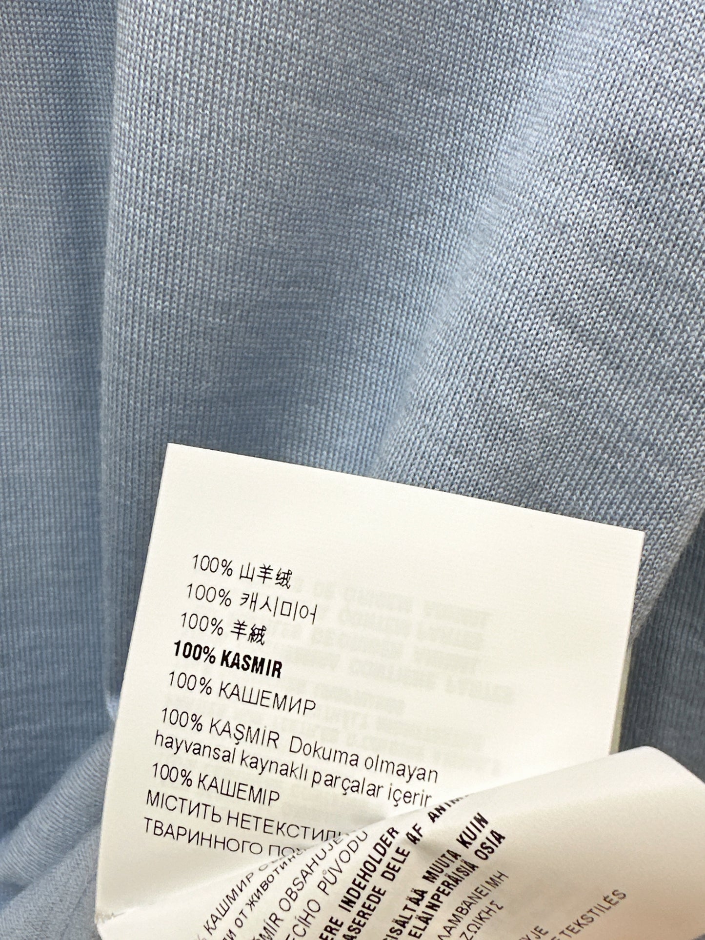 Half-open placket knit sweater