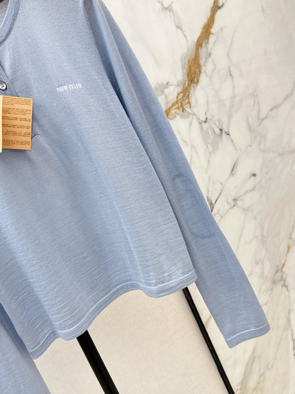 Half-open placket knit sweater