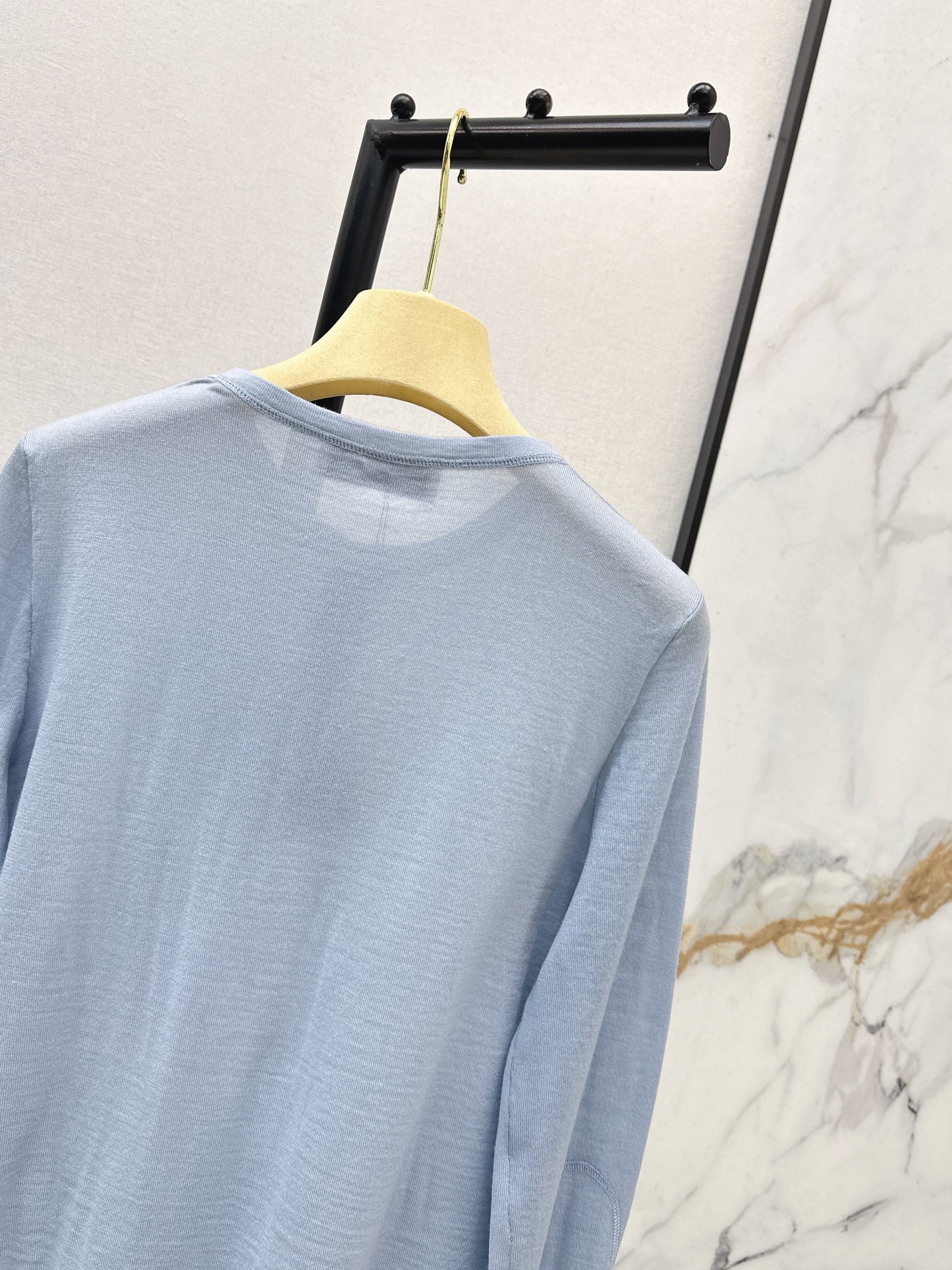 Half-open placket knit sweater