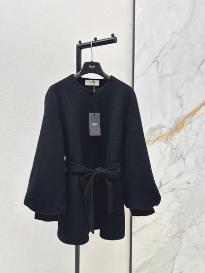 Mid-length coat with fox fur trim
