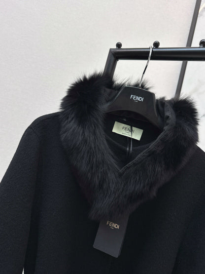 Mid-length coat with fox fur trim