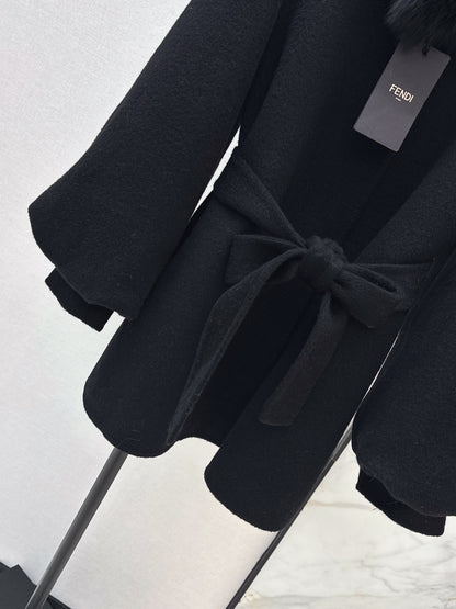 Mid-length coat with fox fur trim