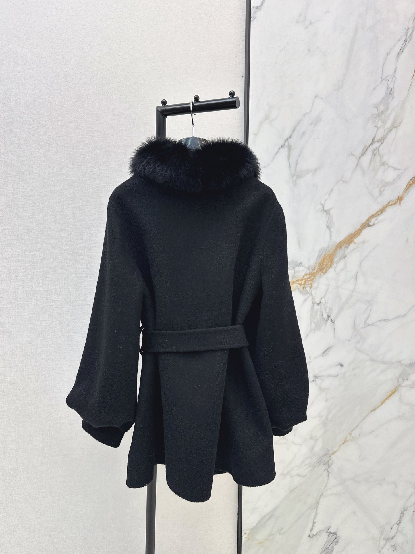 Mid-length coat with fox fur trim