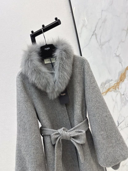 Mid-length coat with fox fur trim