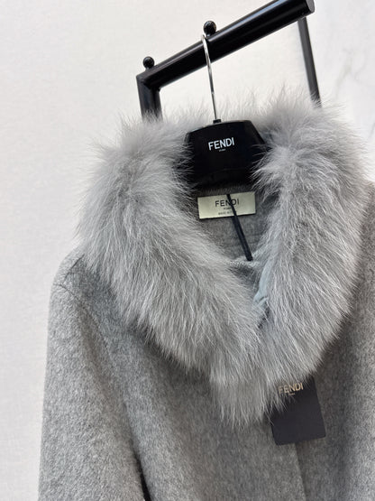 Mid-length coat with fox fur trim