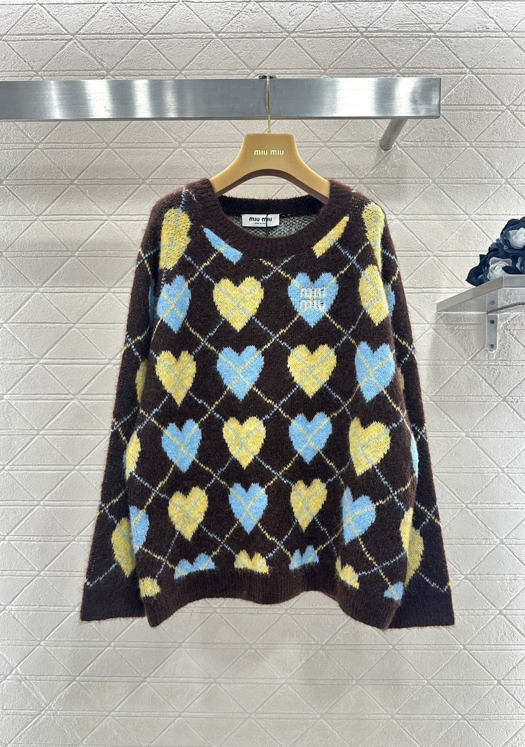 Heart-patterned plaid sweater