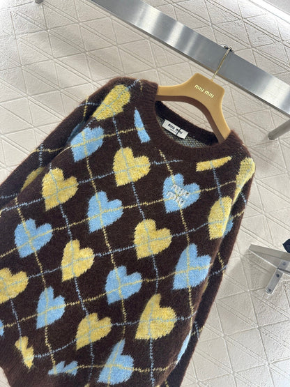 Heart-patterned plaid sweater