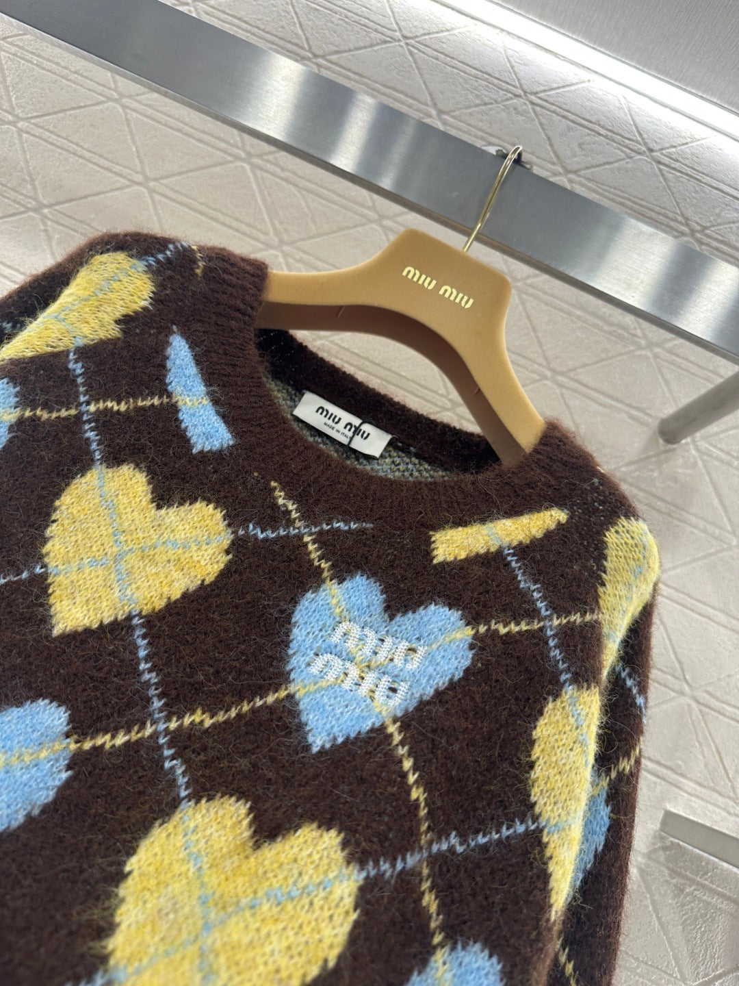 Heart-patterned plaid sweater