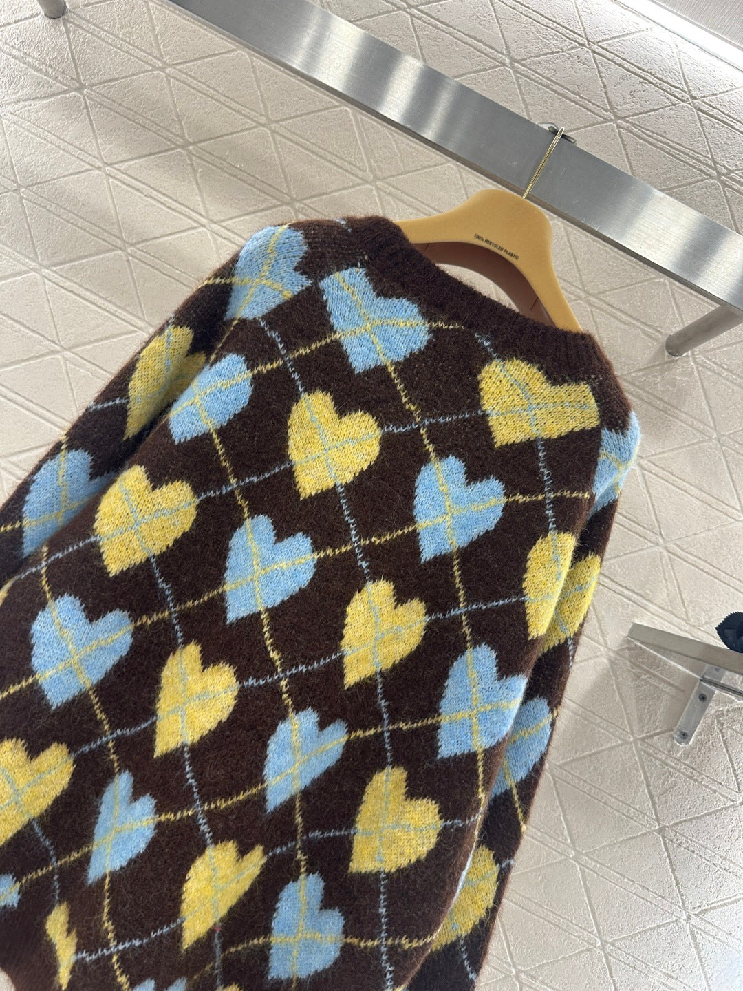 Heart-patterned plaid sweater