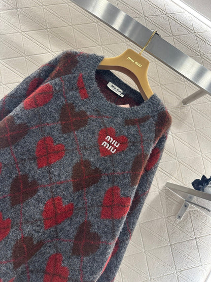 Heart-patterned plaid sweater
