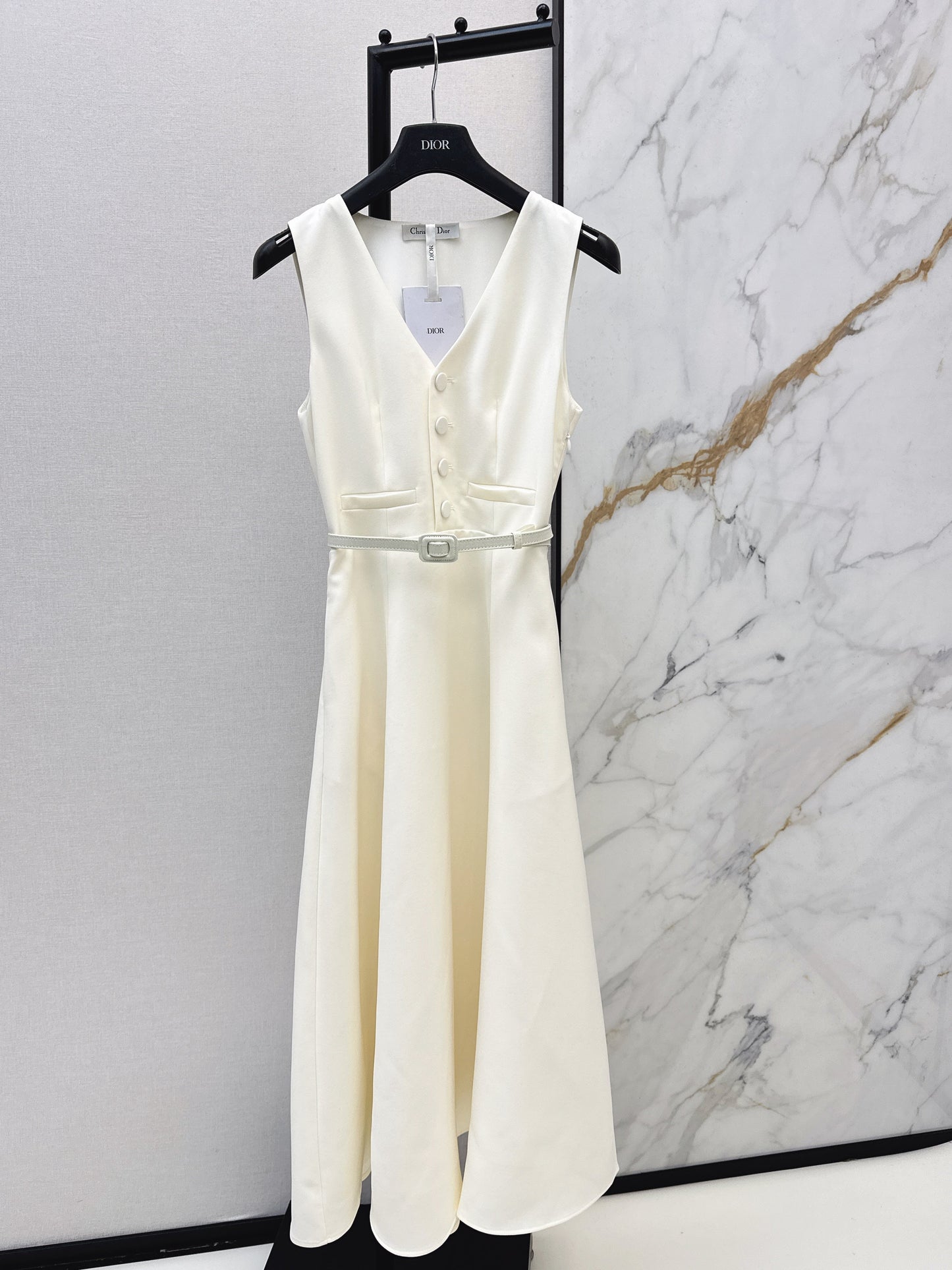 Sleeveless mini dress with bow