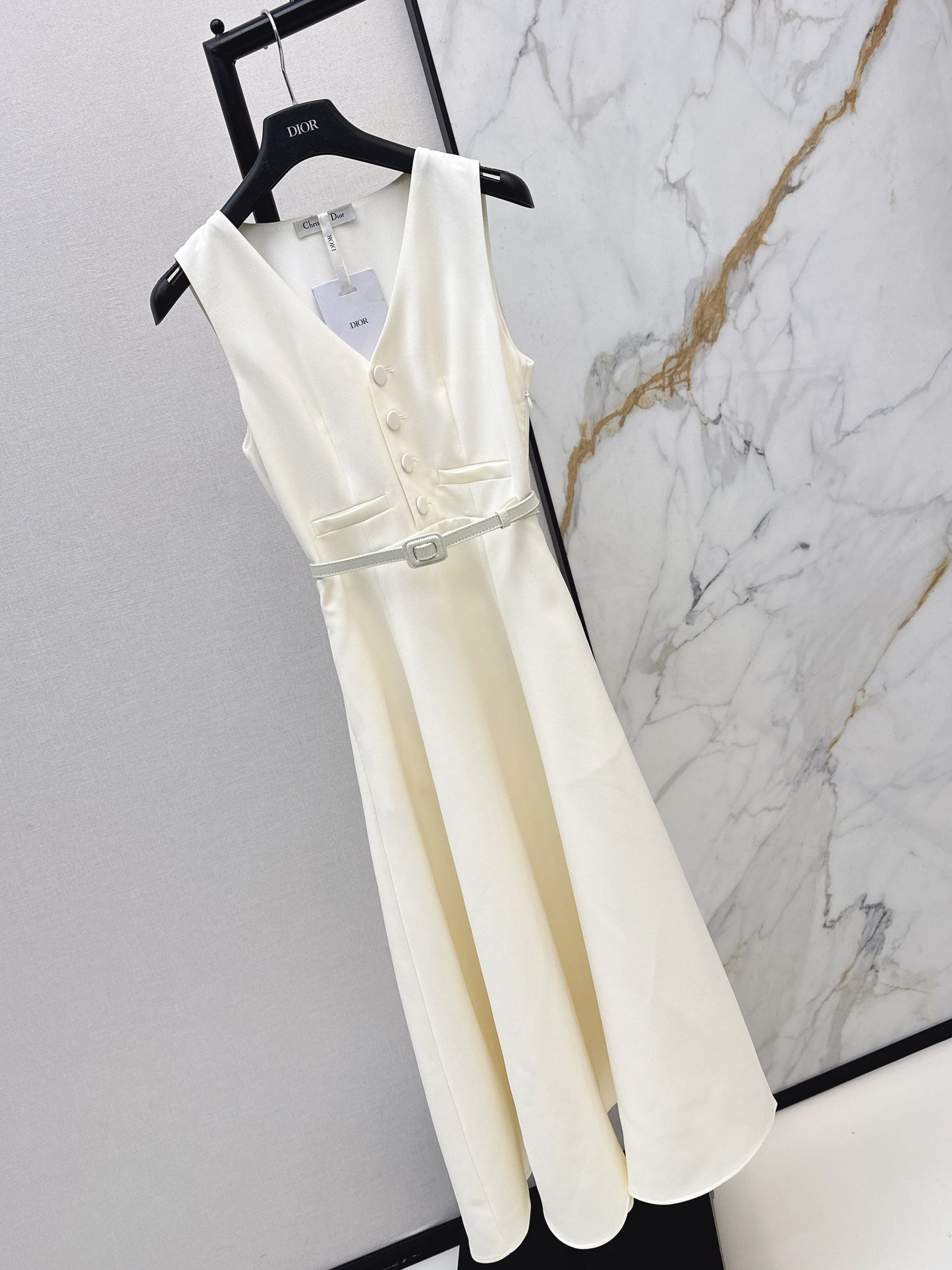 Sleeveless mini dress with bow