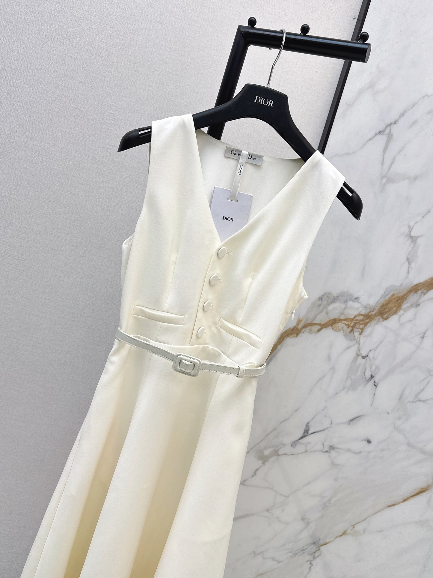 Sleeveless mini dress with bow