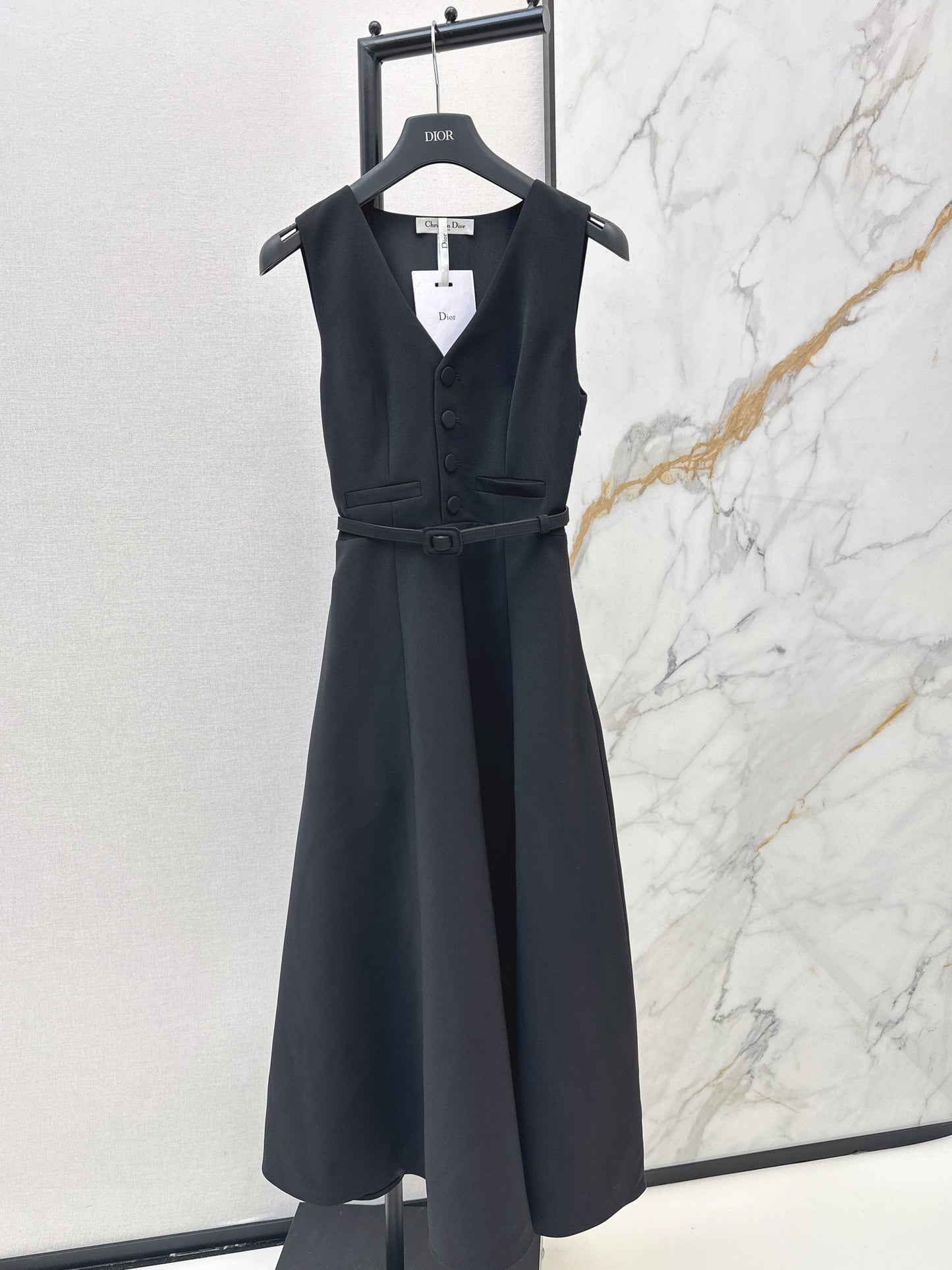 Sleeveless mini dress with bow