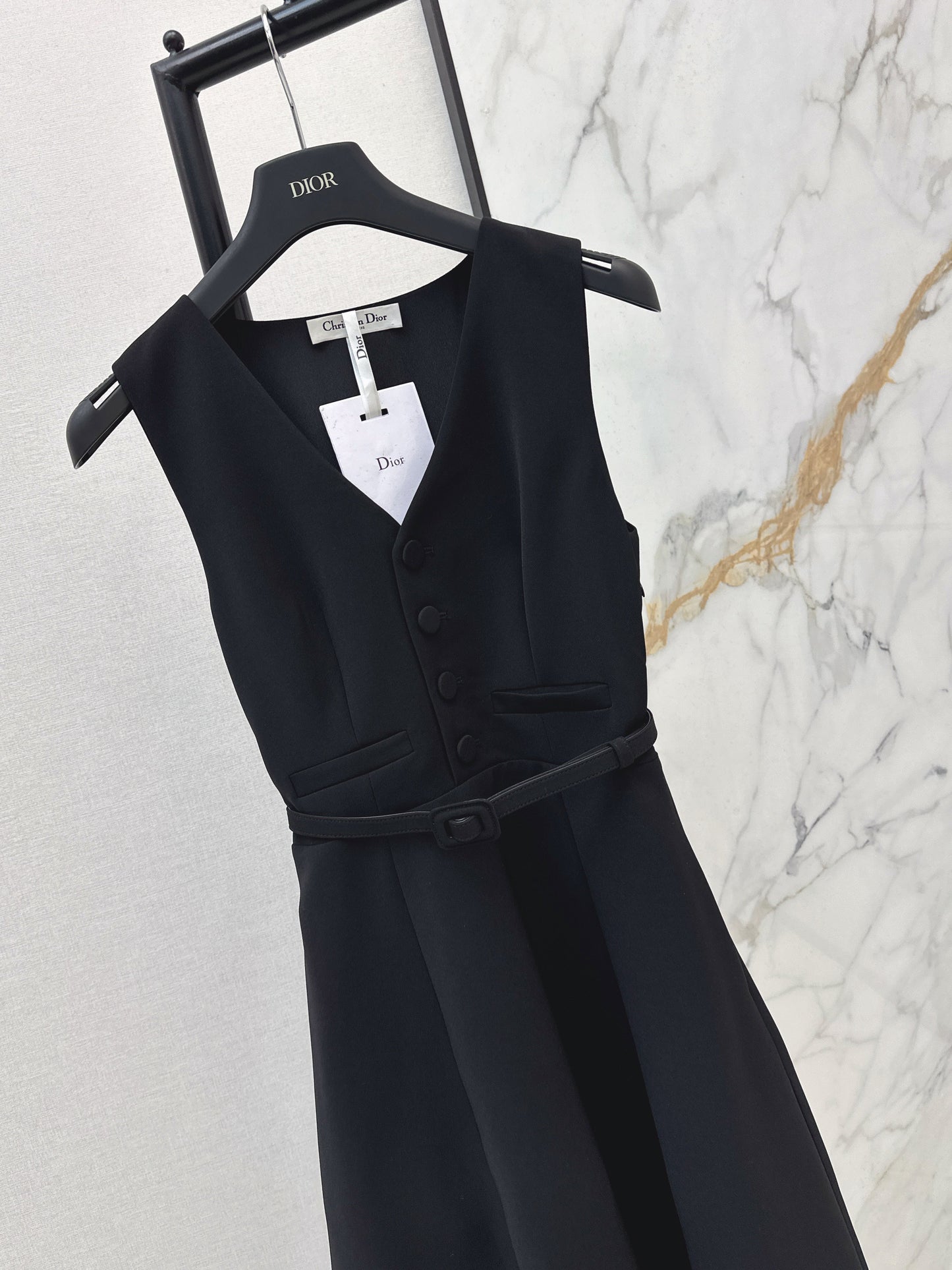 Sleeveless mini dress with bow