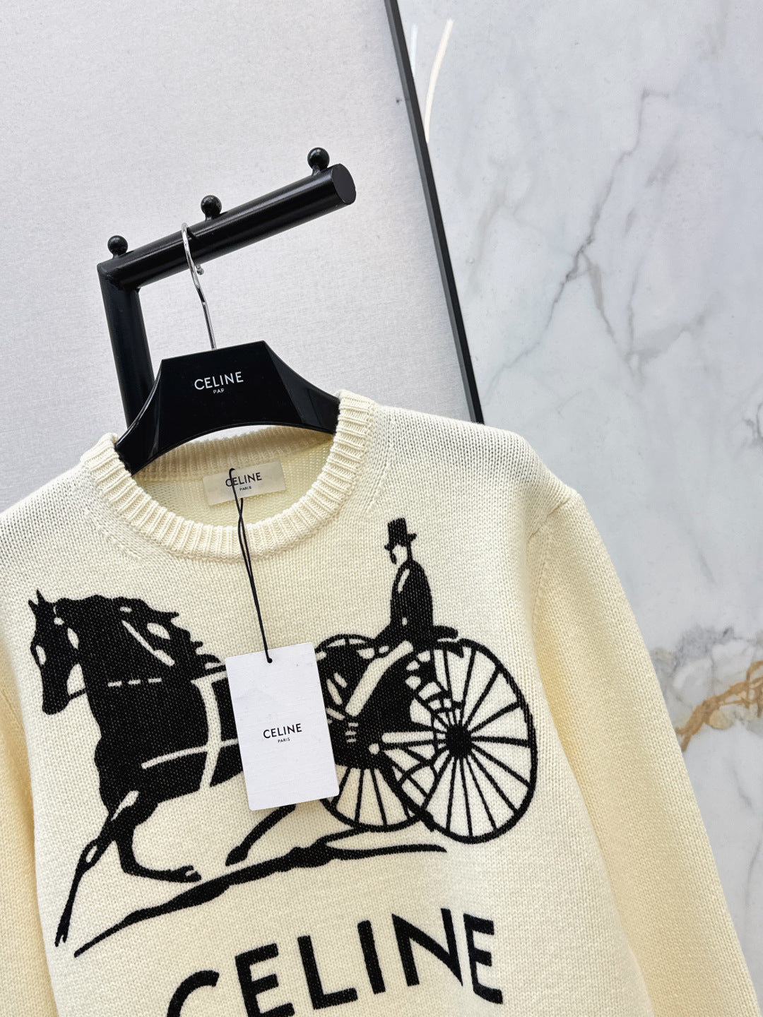 Carriage Pattern Cream Sweater